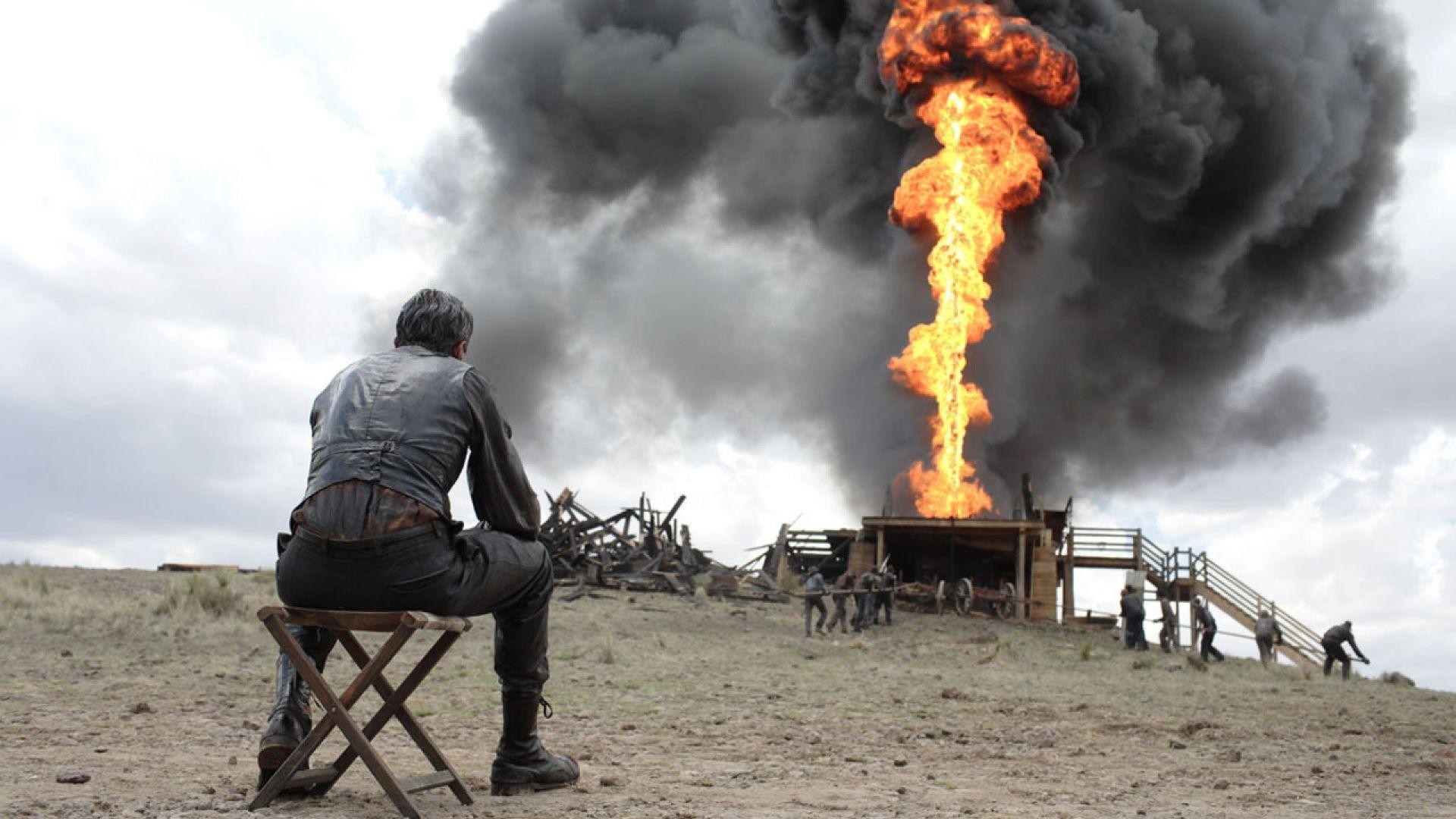 Daniel Plainview watches an oil derrick burn in There Will Be Blood